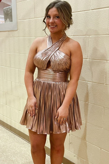 Metallic gold halter A-line homecoming dress with pleated skirt.
