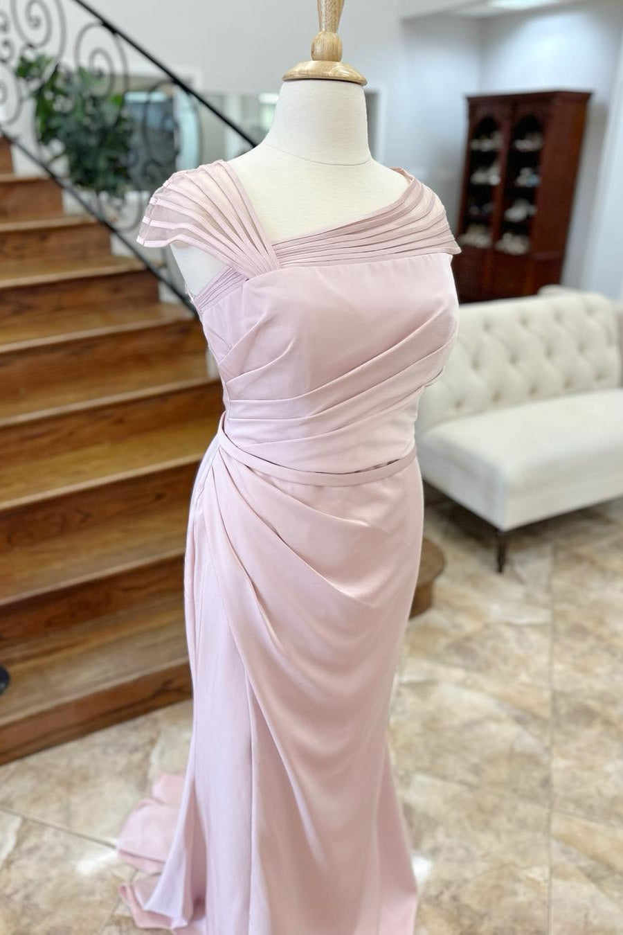 Pink asymmetrical mermaid Mother of the Bride dress with elegant draping.