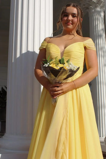 Radiant yellow A-line chiffon prom gown featuring an off-the-shoulder neckline, pleated bodice, and illusion details.