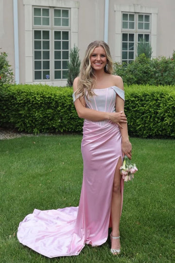 Pink off-the-shoulder mermaid dress with ruched corset and lace-up back.