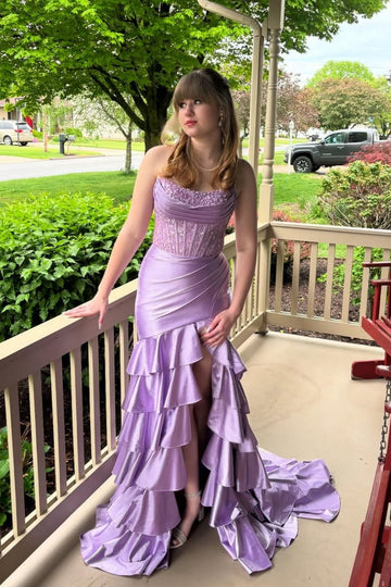 Purple strapless A-line dress with beaded illusion corset and ruffles.