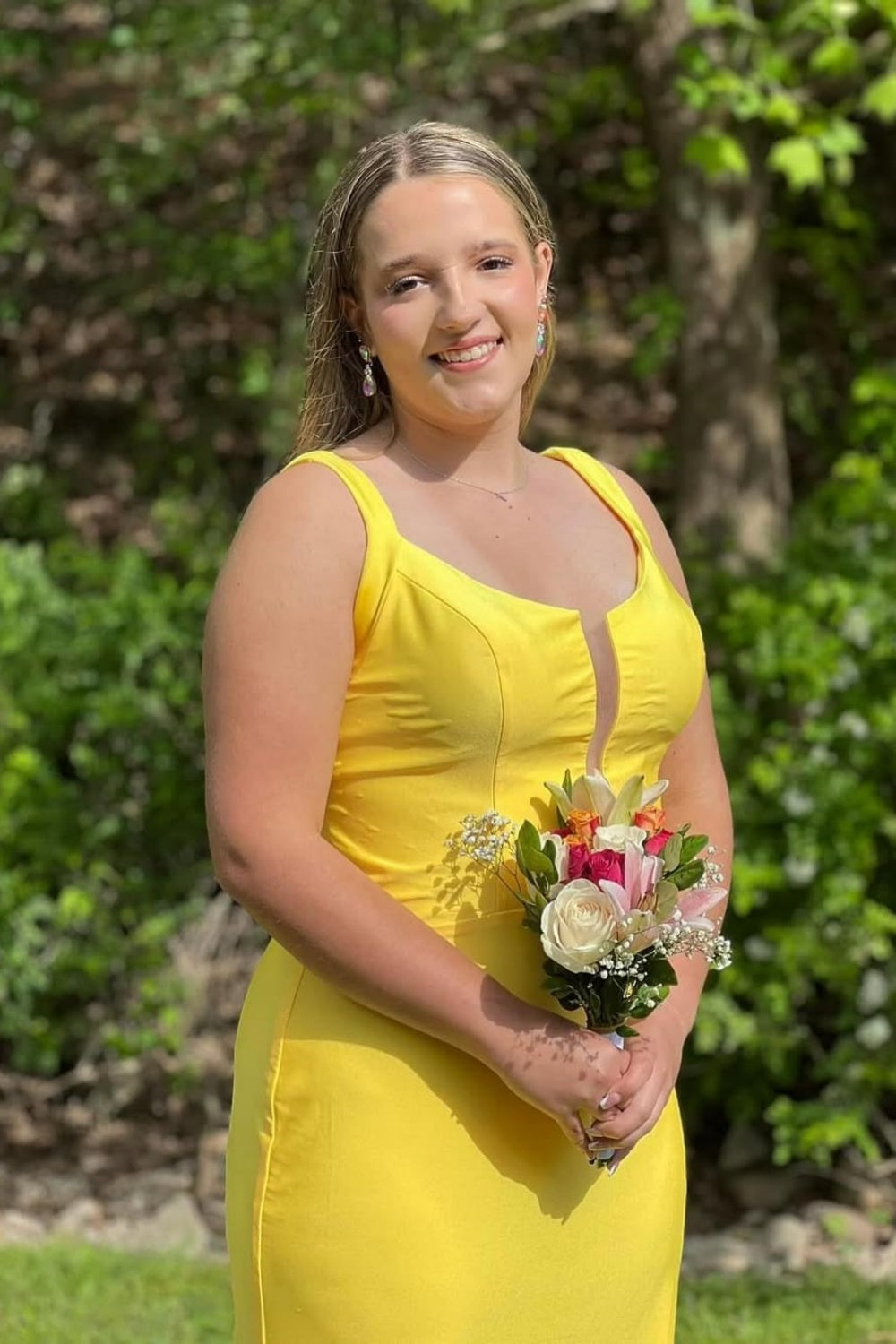 Yellow mermaid satin prom dress with a plunging V-neck and lace-up back