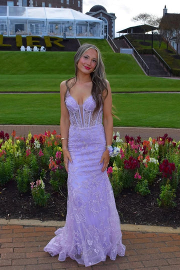 Purple plunging V-neck mermaid prom dress with floral lace appliques.