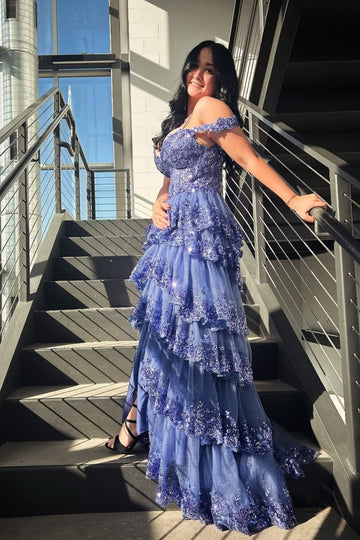 Blue off-the-shoulder A-line gown with sequins, lace appliques, and a tiered ruffle skirt.