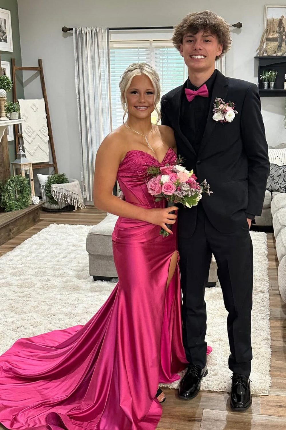 Pink satin mermaid prom dress with beading, side slit, and long train.