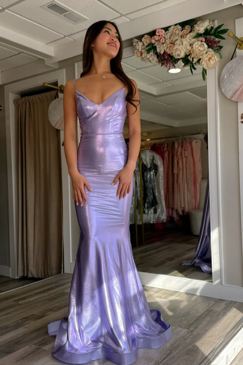 Lavender satin mermaid prom dress with spaghetti straps and long train.