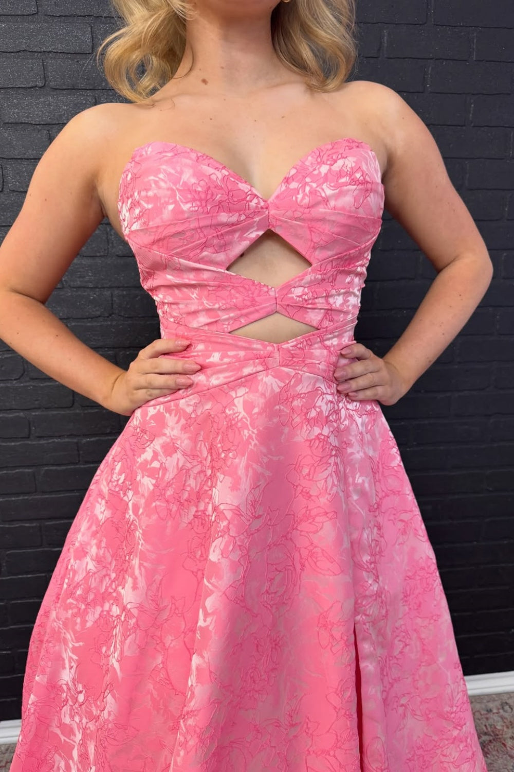 Floral print A-line prom dress with strapless keyhole neckline and lace-up corset back.