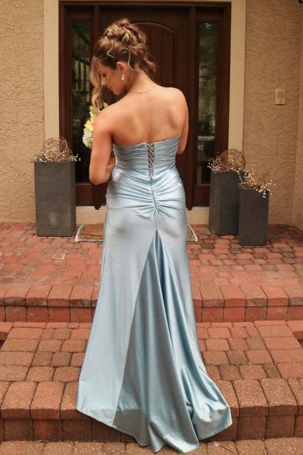 Silver long prom dress with ruched sweetheart neckline, keyhole detail, and corset lace-up back.