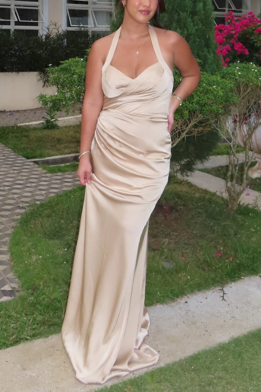 Champagne halter ruched fitted formal dress with open tie back.