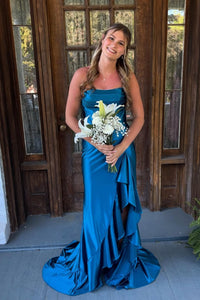 Royal blue A-line prom dress featuring a sophisticated cowl neckline, high side slit, and a dramatic ruffled hemline.