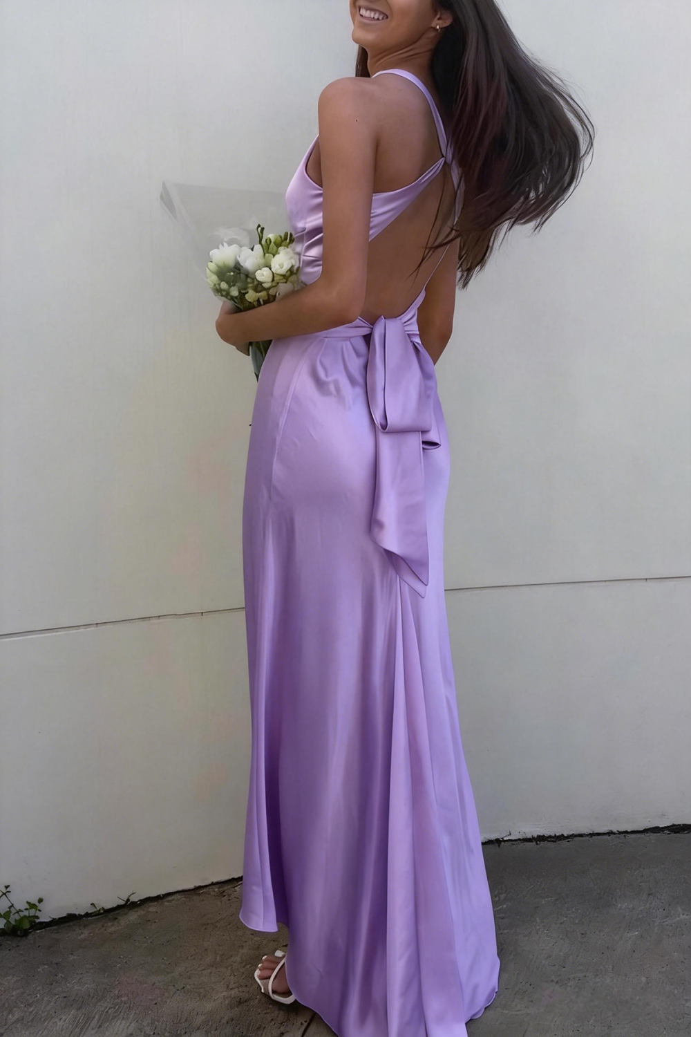 Purple fitted satin prom dress featuring a halter neckline with a twist-front chest detail and a sexy open tie-back.