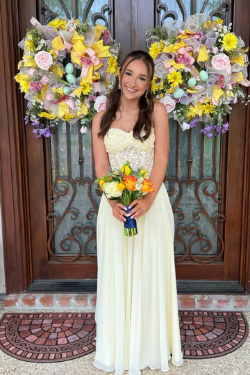 Yellow A-line formal dress featuring sweetheart neckline and lace appliques.