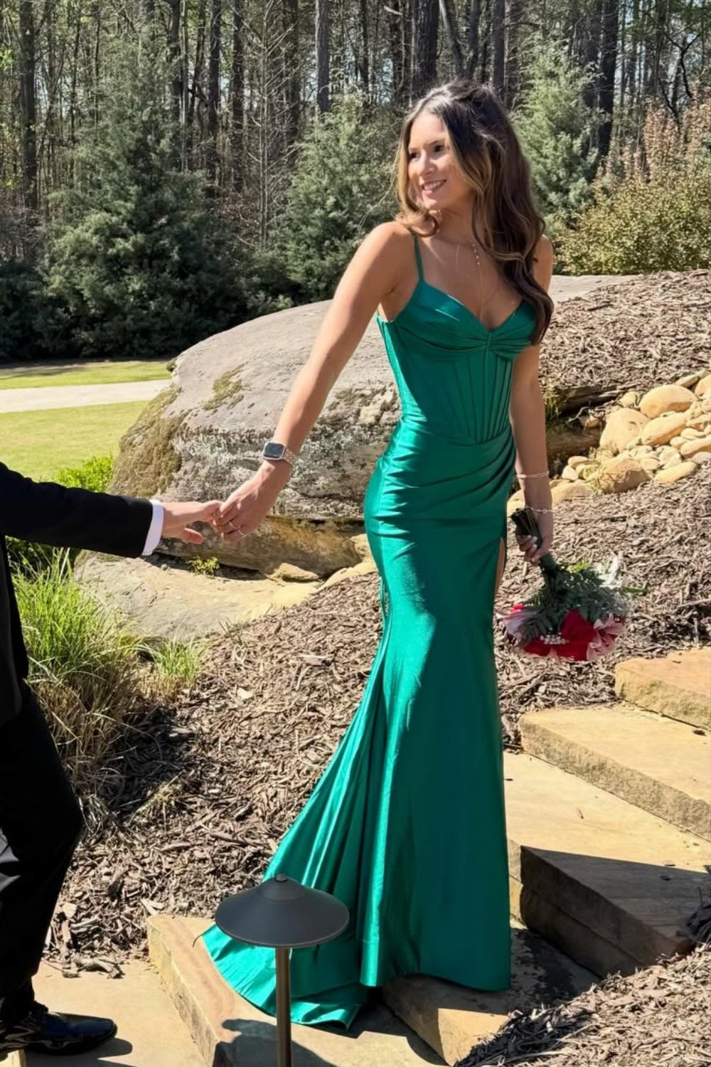 Pleated mermaid prom dress with spaghetti straps and side slit.