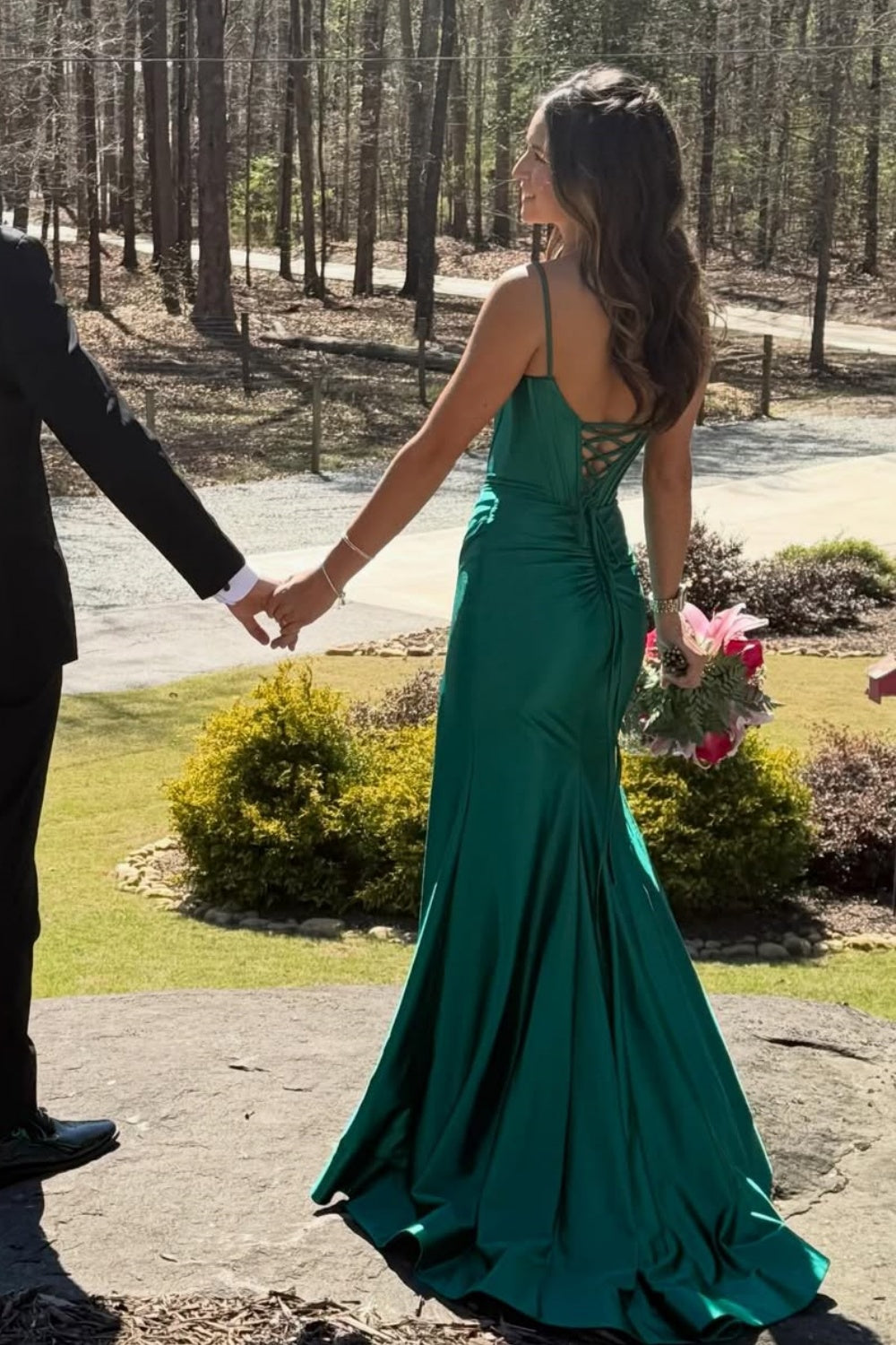 Pleated mermaid prom dress with spaghetti straps and side slit.