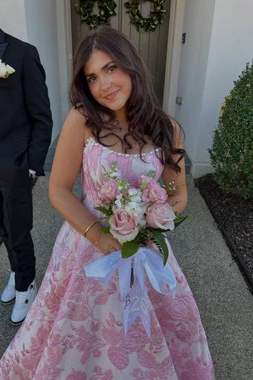 Floral print A-line dress with lace appliqués and pearl neckline.
