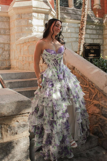 Tiered chiffon A-line floral dress with lace appliqués and side slit.