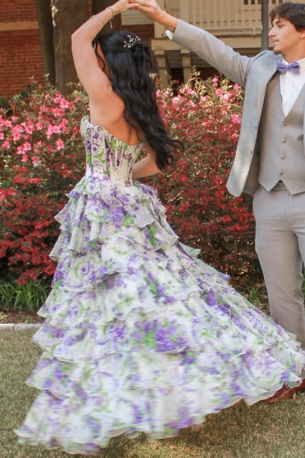 Tiered chiffon A-line floral dress with lace appliqués and side slit.
