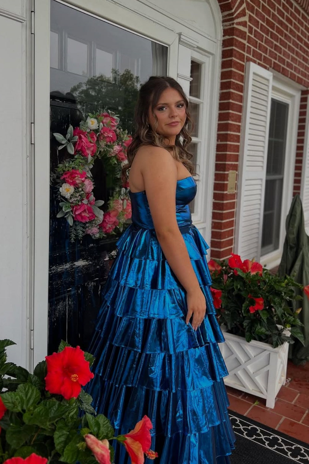 Royal blue metallic strapless A-line tiered plus size prom dress.
