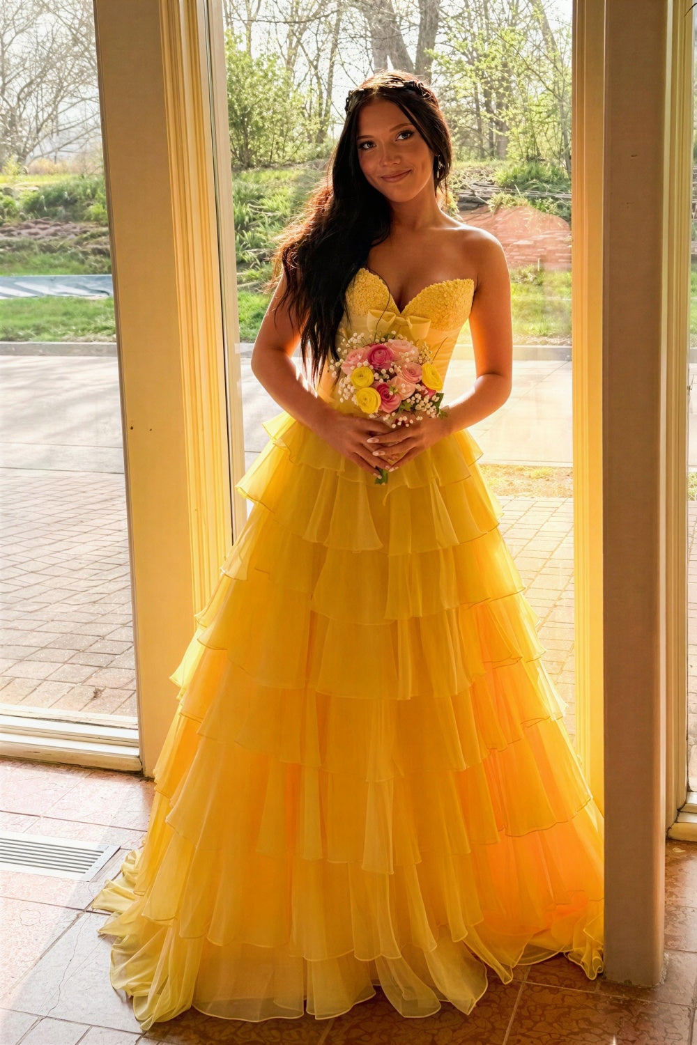 Lace appliques strapless A-line ruffle prom dress with bow.