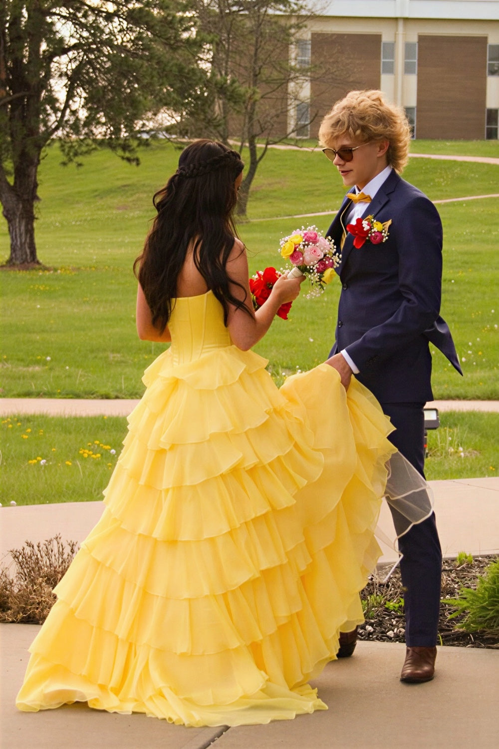 Lace appliques strapless A-line ruffle prom dress with bow.