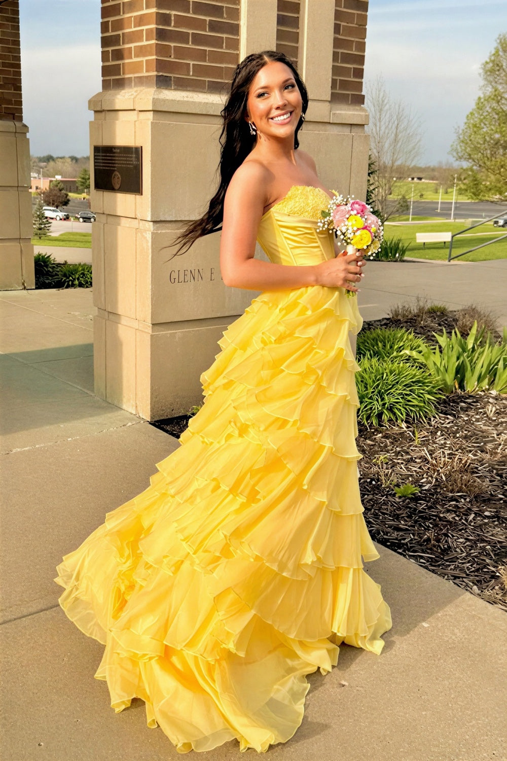 Lace appliques strapless A-line ruffle prom dress with bow.