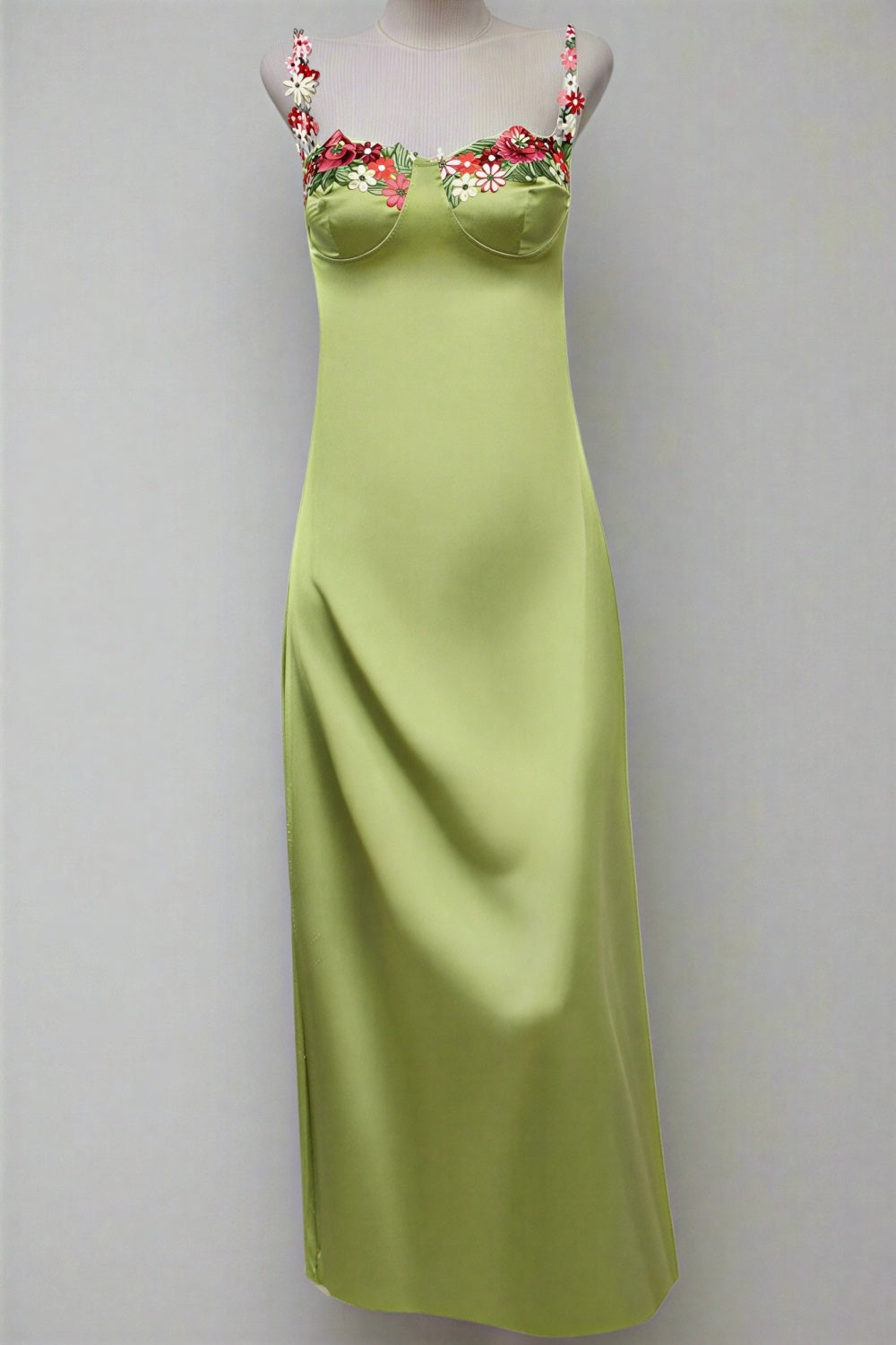 long green bodycon dress with straps and 3d flower embellishments