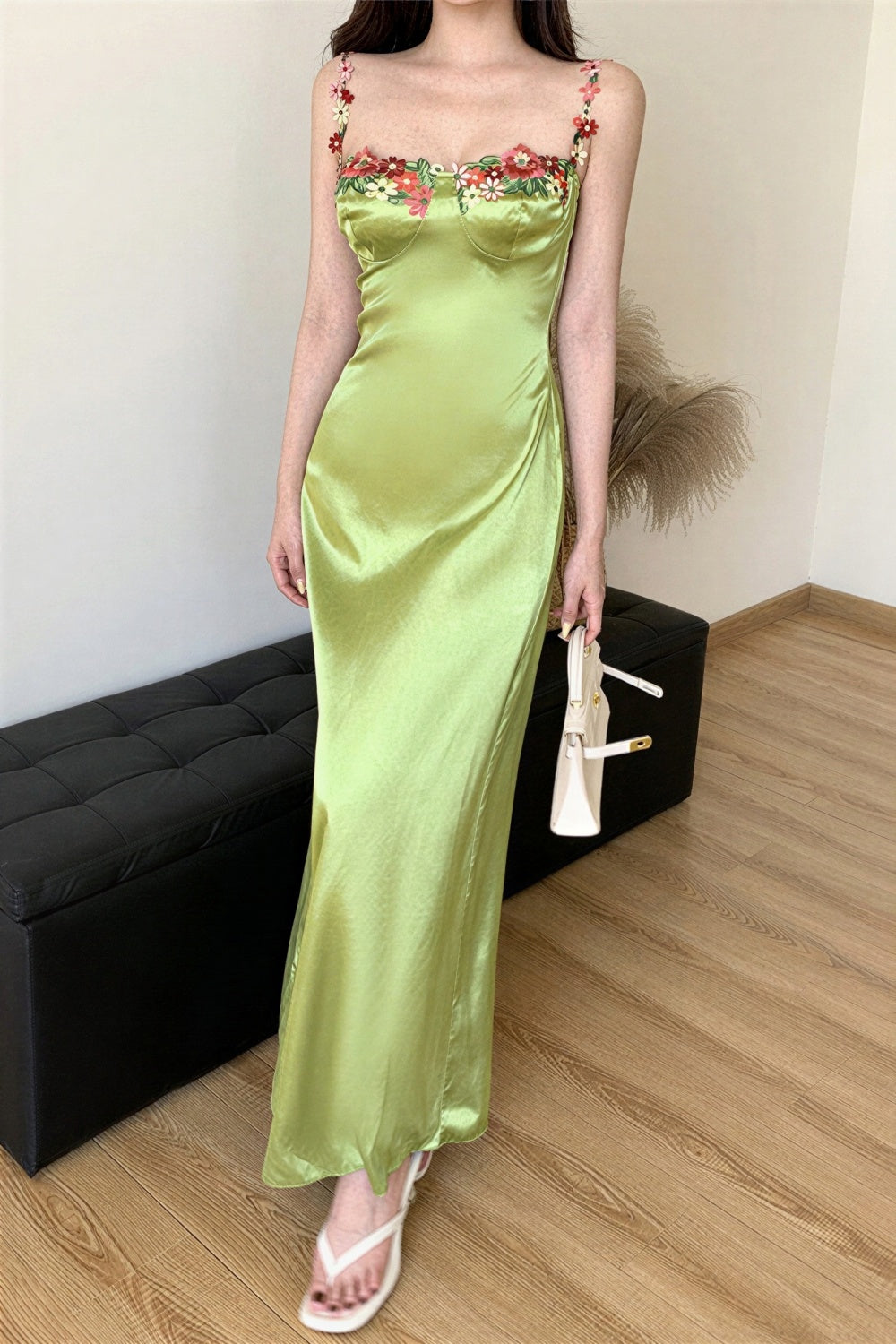 long green bodycon dress with straps and 3d flower embellishments