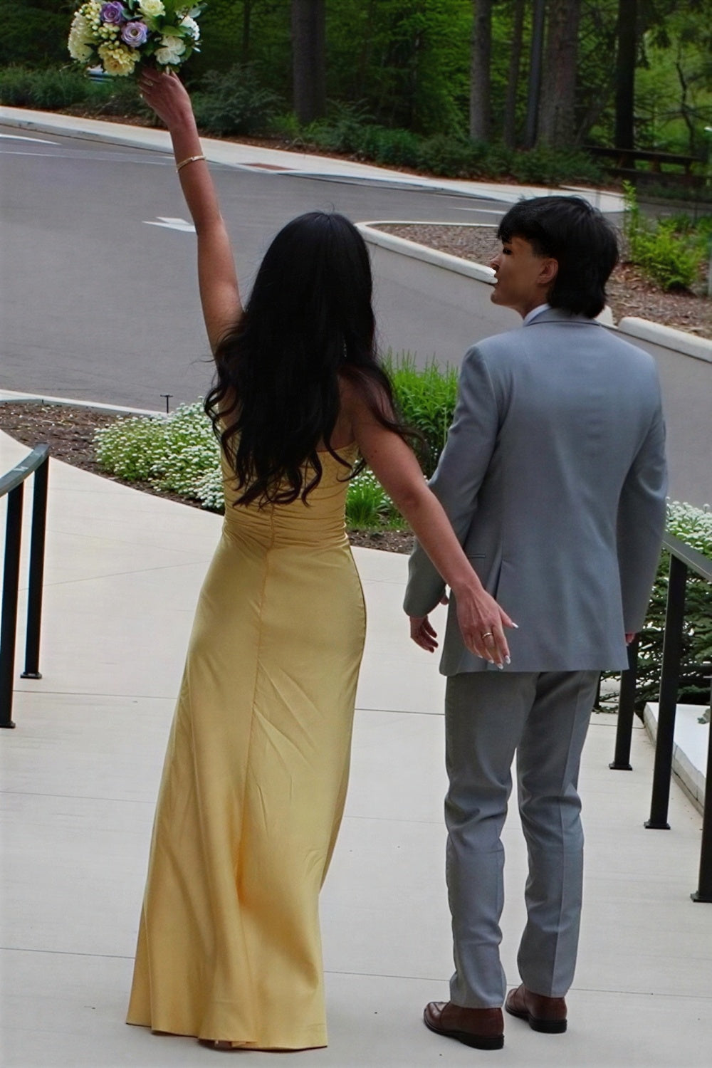 fitted yellow evening gown with twisted chest and keyhole detail